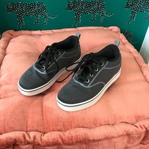 Heelys roller skating shoes.